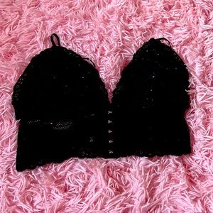 Black lace corset top with cleavage